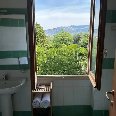 Rosa Lägenhetshotell Sorrento